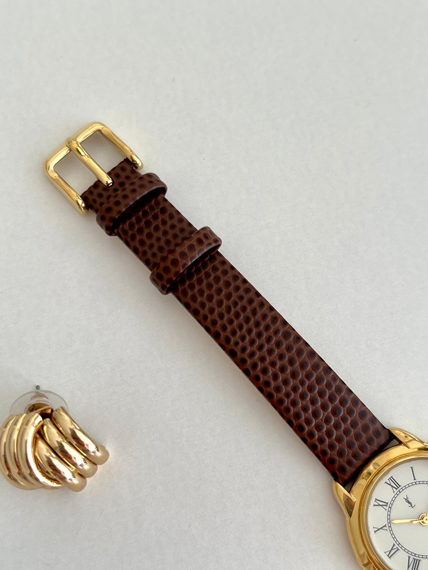 Yves Saint Laurent Roman Numeral Gold Tone Watch