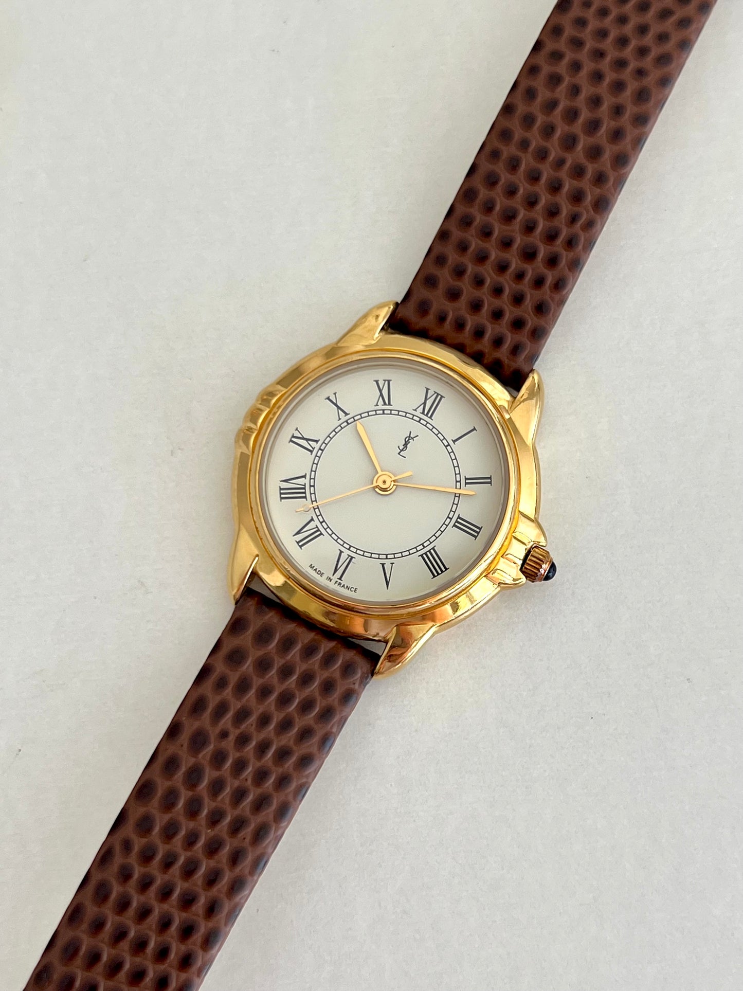 Yves Saint Laurent Roman Numeral Gold Tone Watch