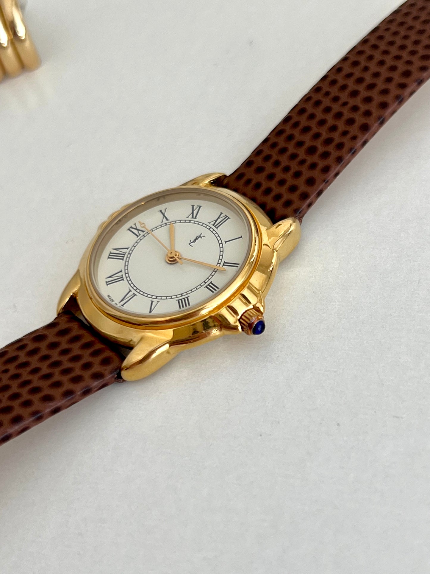 Yves Saint Laurent Roman Numeral Gold Tone Watch