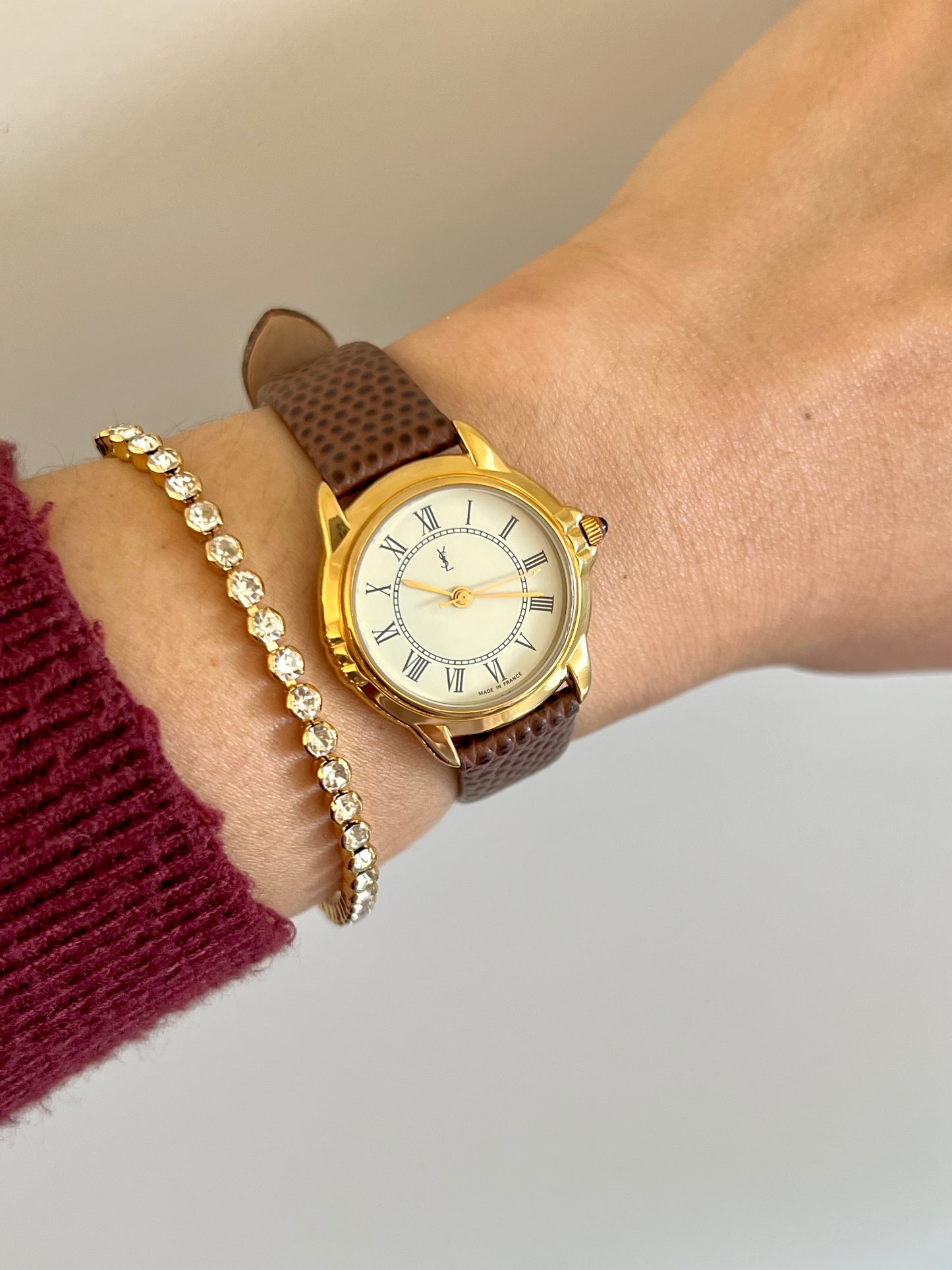 Yves Saint Laurent Roman Numeral Gold Tone Watch