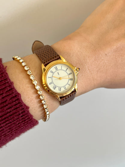 Yves Saint Laurent Roman Numeral Gold Tone Watch