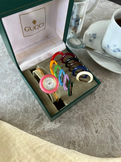 Gucci 1100L Interchangeable Bezel Women’s Watch Full Set of 12 - 2, angled view of a vintage women's watch at Gilded Hour.