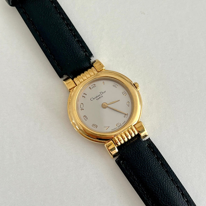 Christian Dior gold dress watch with black strap