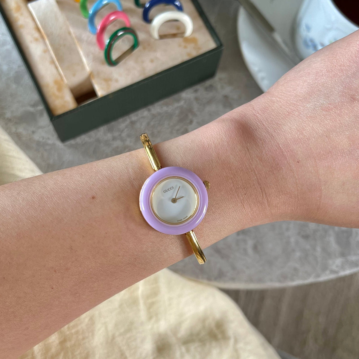 Gucci 1100L Interchangeable Bezel Women’s Watch Full Set of 12, dial close up of a vintage women's watch at Gilded Hour.