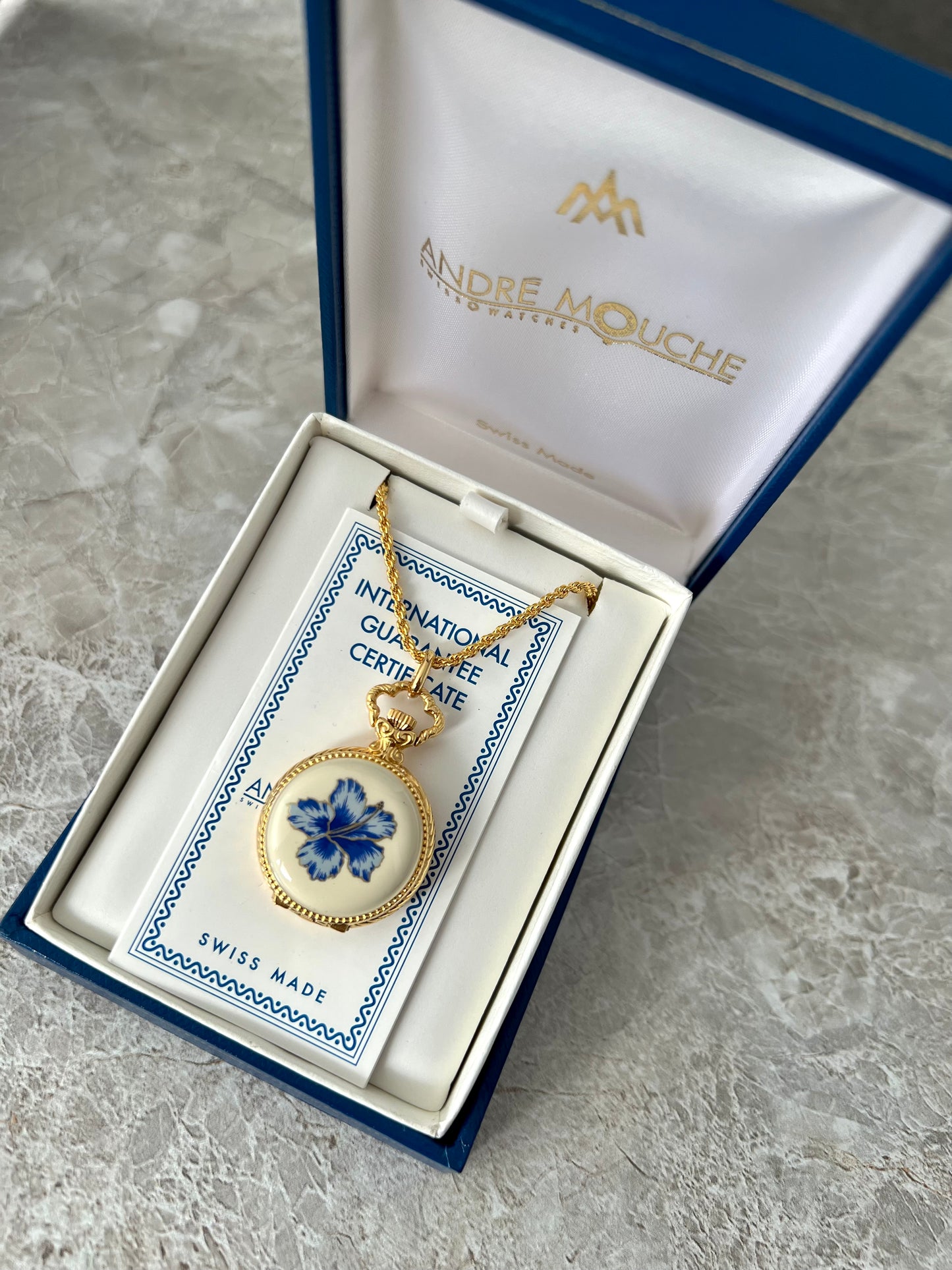 Andre Mouche Blue Floral Gold Tone Women’s Pendant Watch