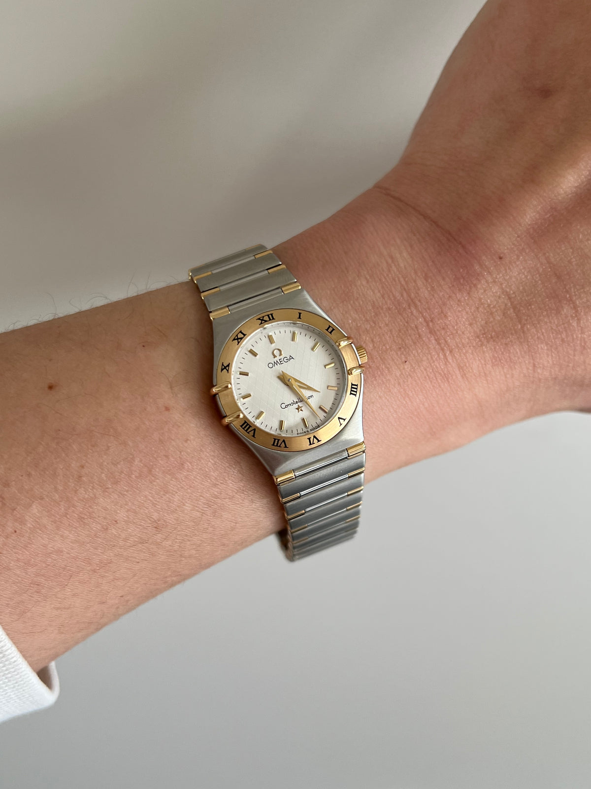 Omega Constellation Two-tone Women’s Watch, angled view of a vintage women's watch at Gilded Hour.