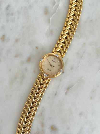 Seiko Exceline Woman's Watch with Diamonds and Sculpted Pattern Bracelet