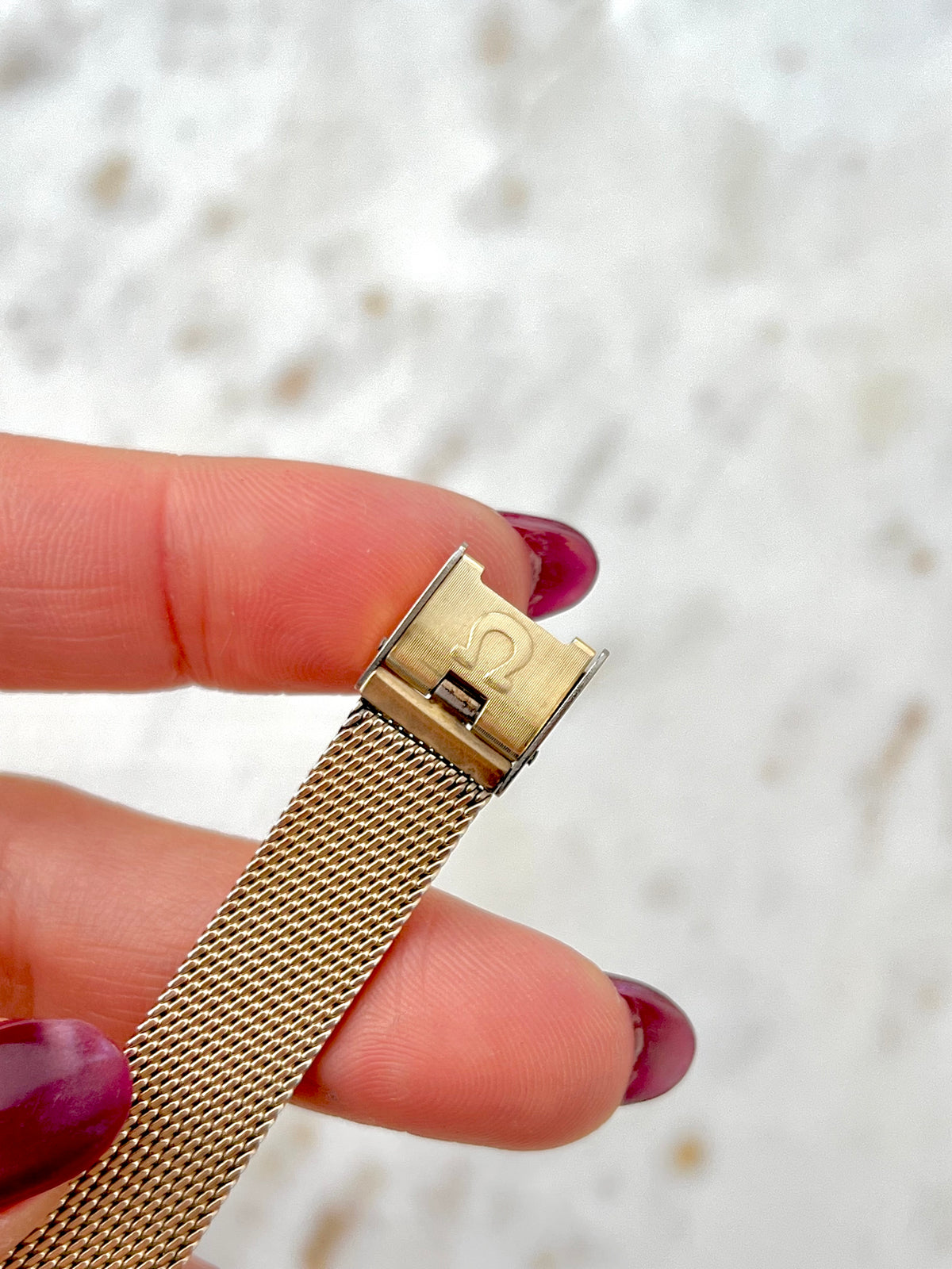 Omega Rectangular 14k Gold Filled Mesh Bracelet Watch, bracelet detail of a vintage women's watch at Gilded Hour.
