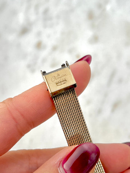 Omega Rectangular 14k Gold Filled Mesh Bracelet Watch, caseback detail of a vintage women's watch at Gilded Hour.
