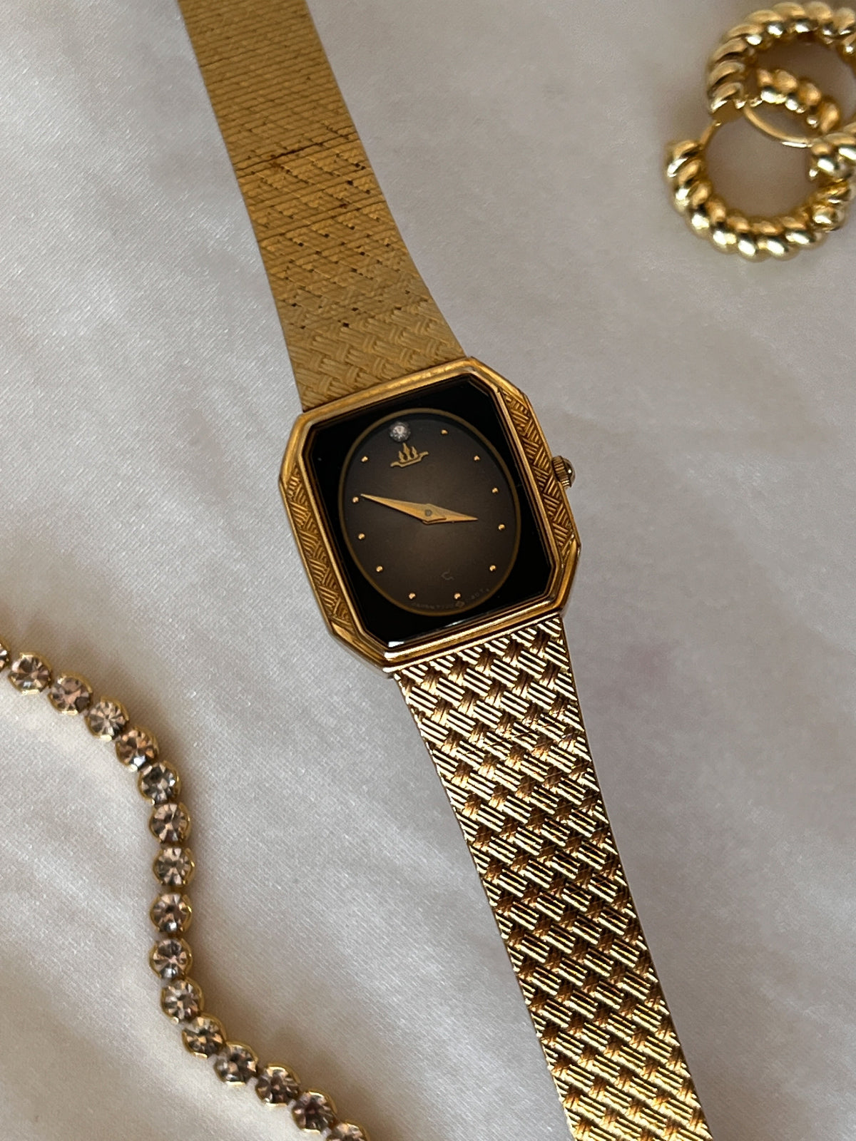 Seiko Burst Dial Galaxy Ladies Watch in NZ and Australia accesorized with earings and tennis bracelet.