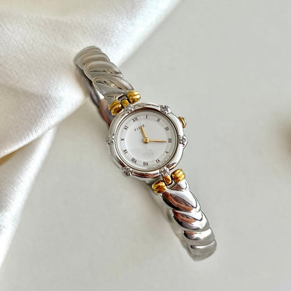 Seiko Tisse bangle watch in gold and silver with inlaid crystals