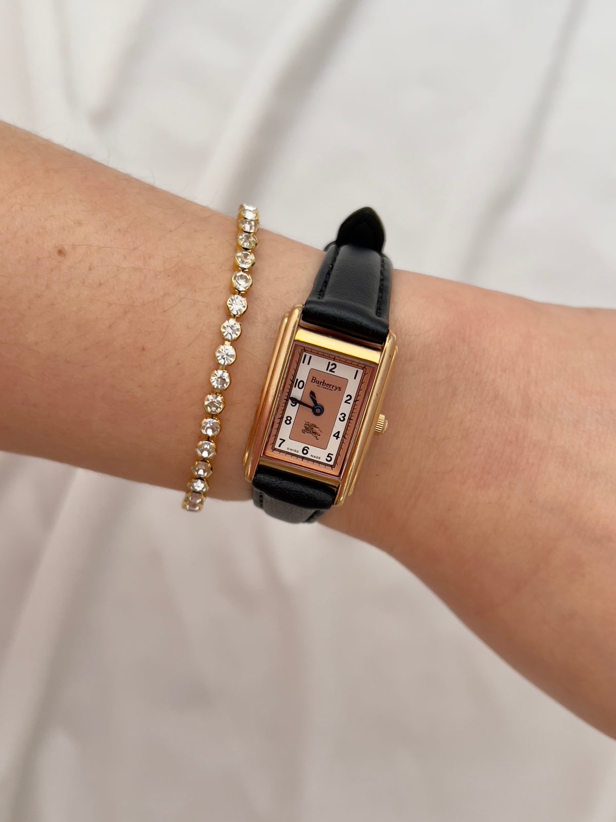 Burberrys Salmon Dial Gold Tank Women’s Watch; black leather strap with burberrys buckle. Product photograph 4 of 15.