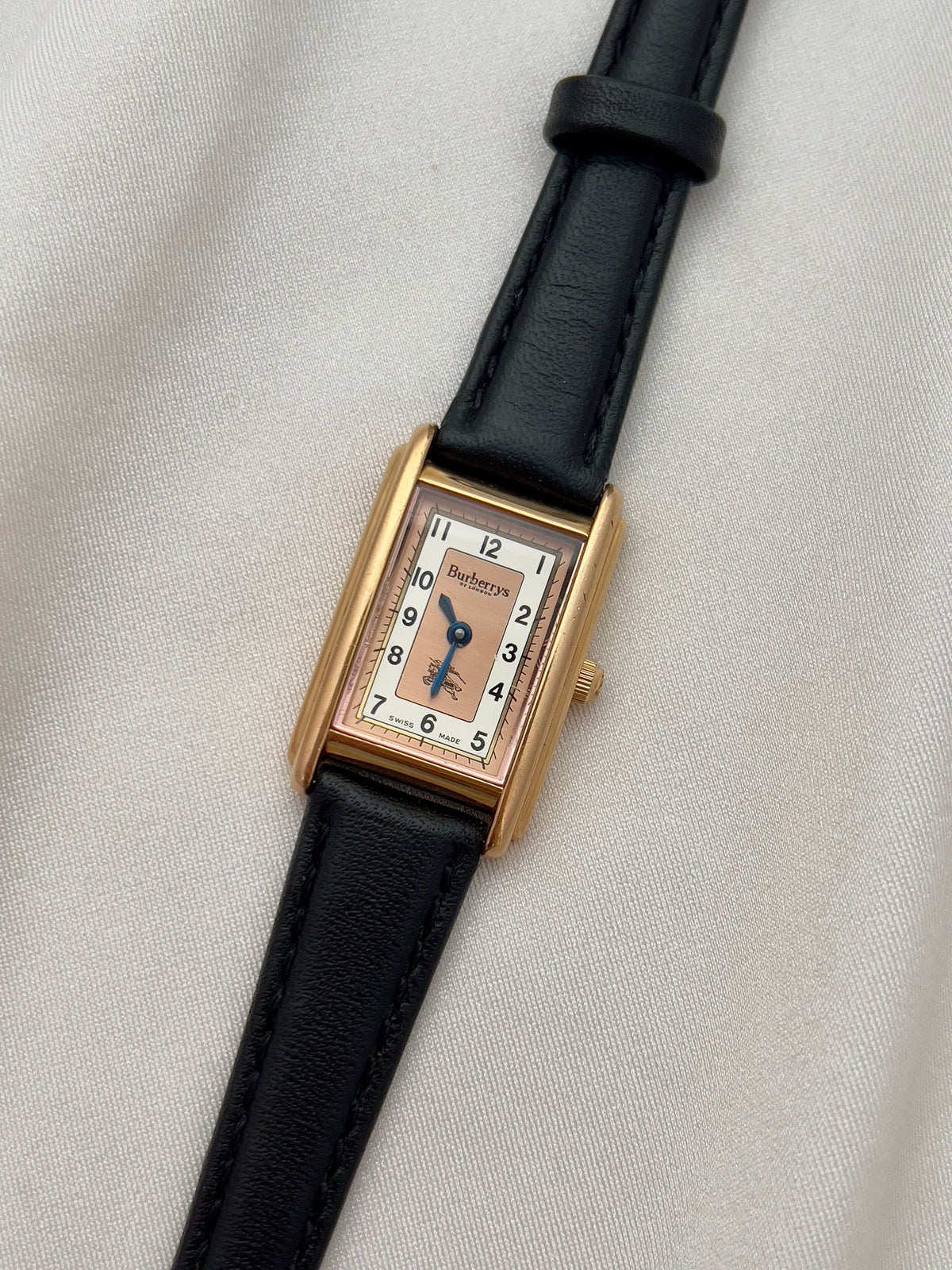 Burberrys Salmon Dial Gold Tank Women’s Watch; black leather strap with burberrys buckle. Product photograph 11 of 15.