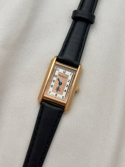 Burberrys Salmon Dial Gold Tank Women’s Watch; black leather strap with burberrys buckle. Product photograph 11 of 15.