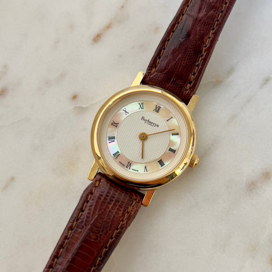 Burberry Gold Watch with Mother of Pearl Dial & Engraved Check Pattern, front view of a vintage women's watch at Gilded Hour.