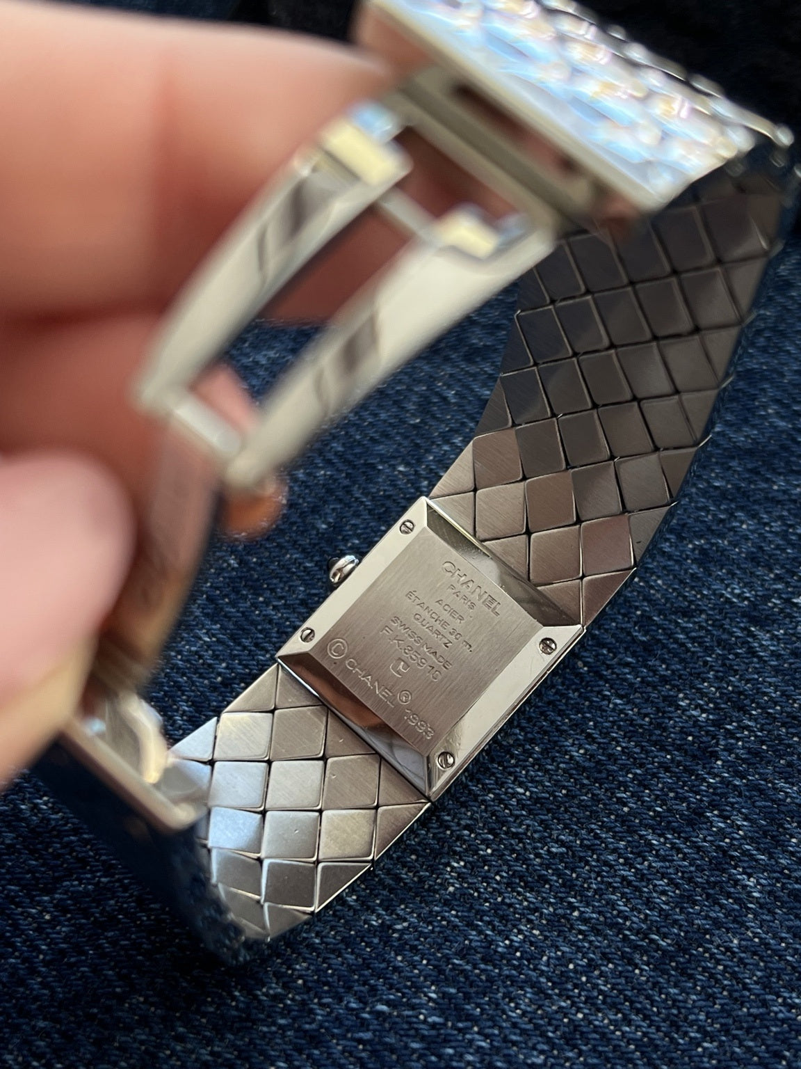 Chanel Matelassé stainless steel caseback with Swiss Made marking and serial F.K.85910