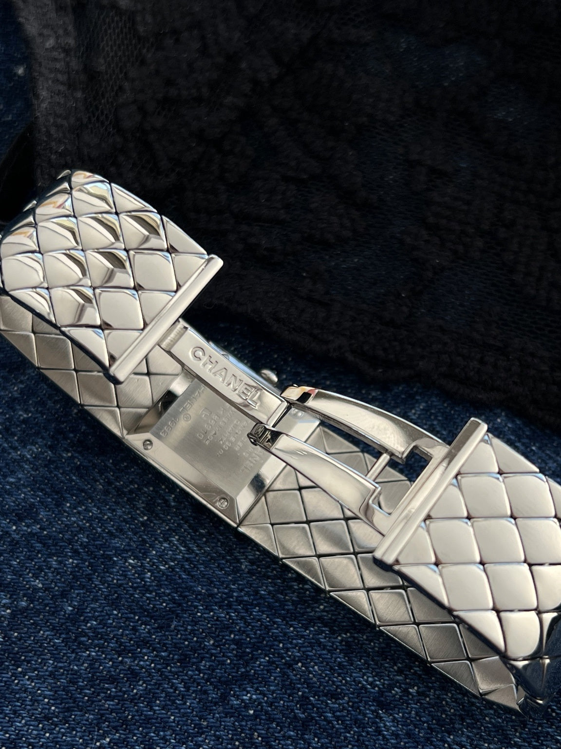 Chanel signed folding clasp and quilted stainless steel bracelet