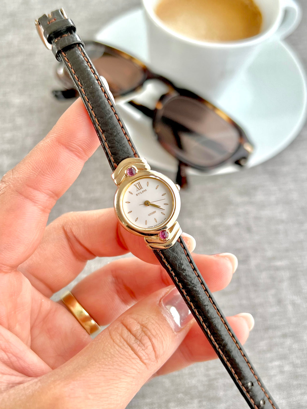 Citizen Gold Toned Women's Watch with Purple Stone, dial close up of a vintage women's watch at Gilded Hour.