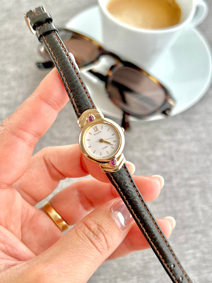 Citizen Gold Toned Women's Watch with Purple Stone, dial close up of a vintage women's watch at Gilded Hour.