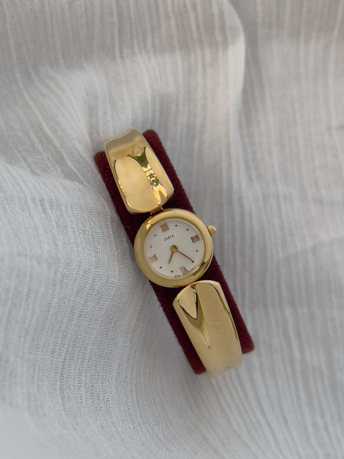 Citizen Chere Women's Gold Bangle Watch — close detail of the dial and band.