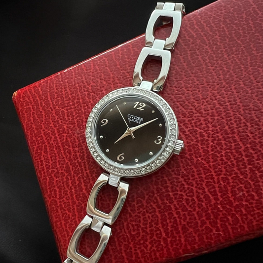 Citizen Black Dial Crystal Bezel Women’s Watch featuring black dial and steel bracelet; vintage watch product image 1.