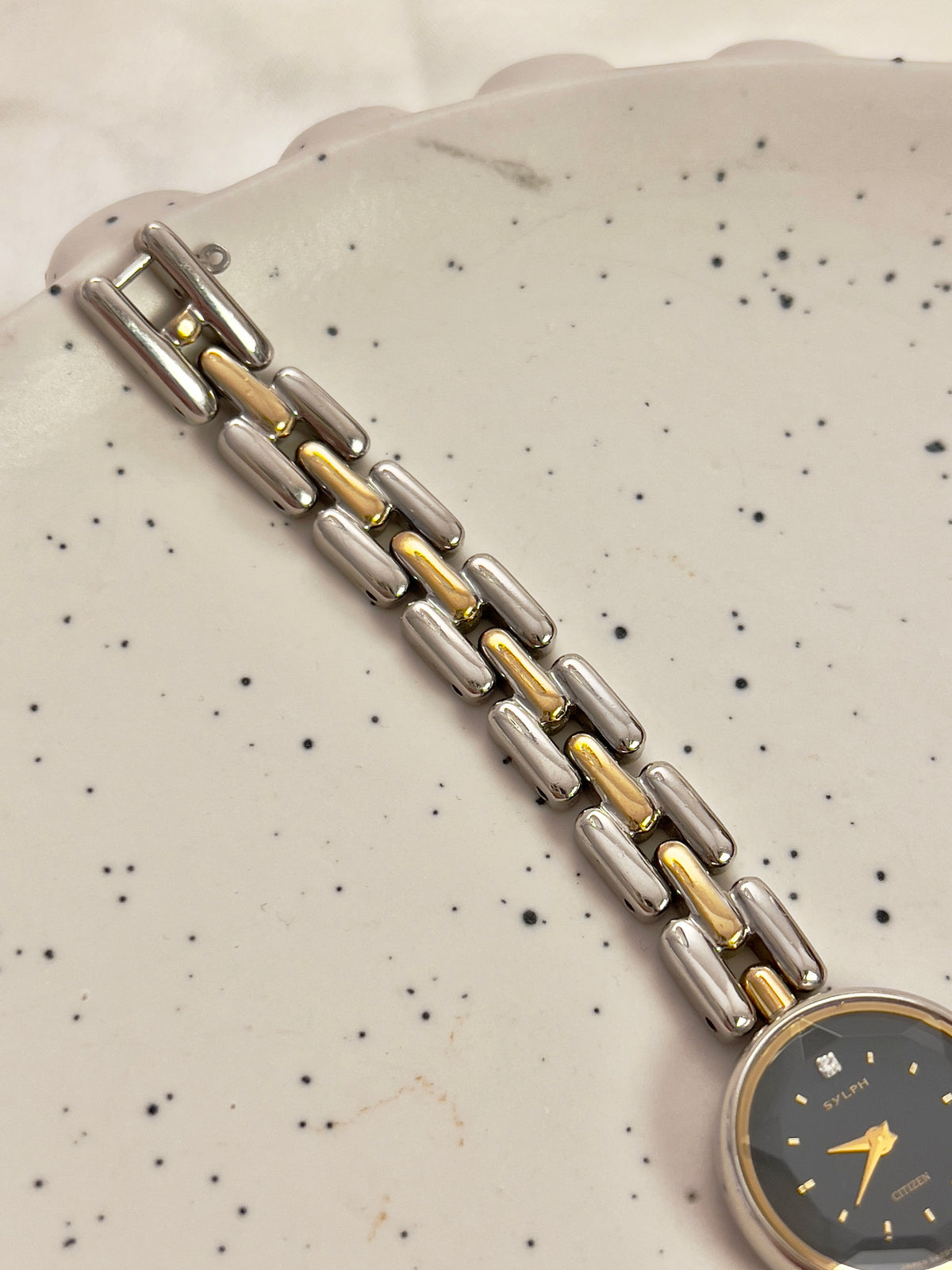 Citizen black dial two-tone women's bracelet watch with faceted crystal