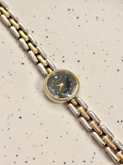 Citizen black dial two-tone women's bracelet watch with faceted crystal