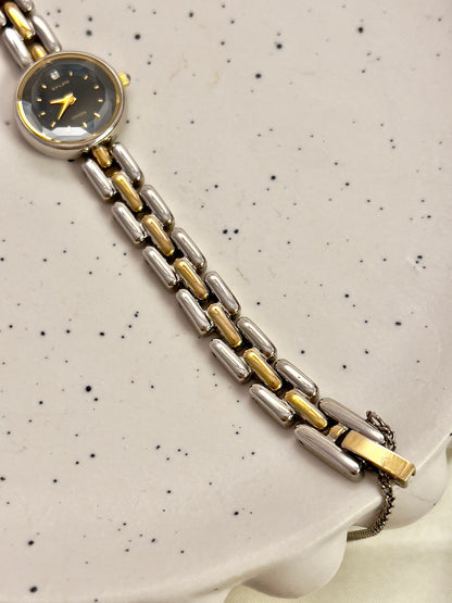 Citizen black dial two-tone women's bracelet watch with faceted crystal