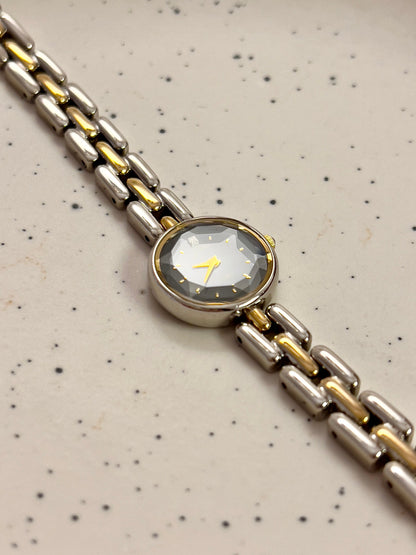 Citizen black dial two-tone women's bracelet watch with faceted crystal