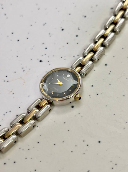 Citizen black dial two-tone women's bracelet watch with faceted crystal