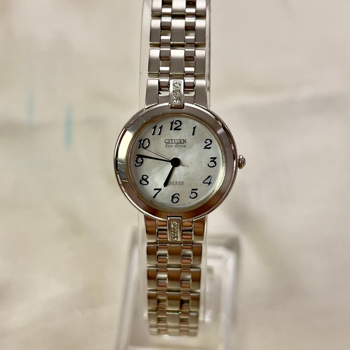 Citizen Exceed Eco-Drive White Dial Blue Hands Women's Watch — product photograph 1