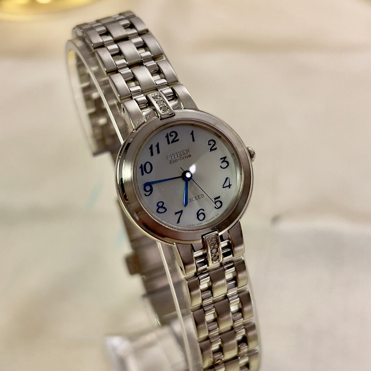 Citizen Exceed Eco-Drive White Dial Blue Hands Women's Watch — product photograph 2