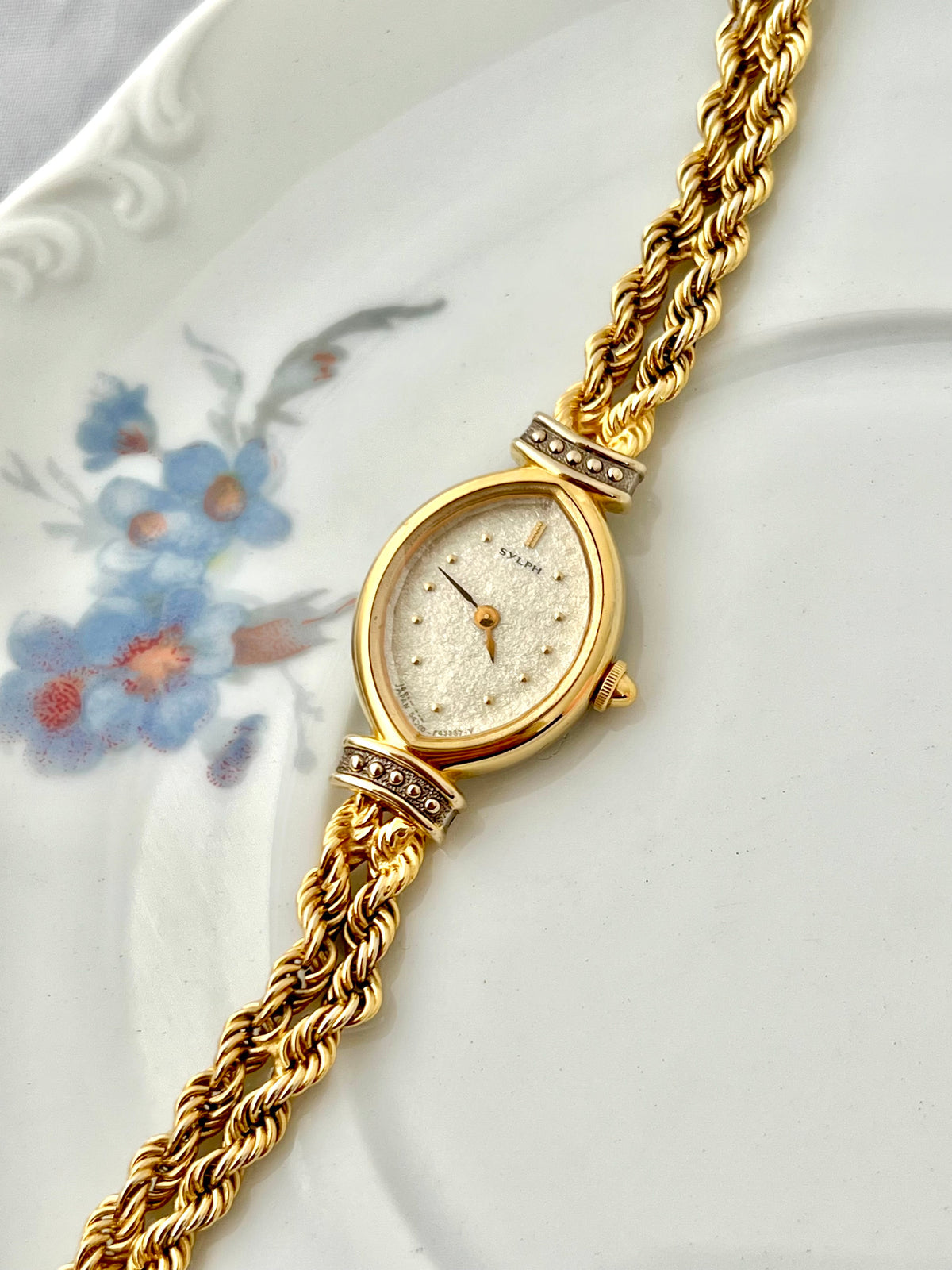 Citizen Sylph oval gold-tone ladies watch, angle.