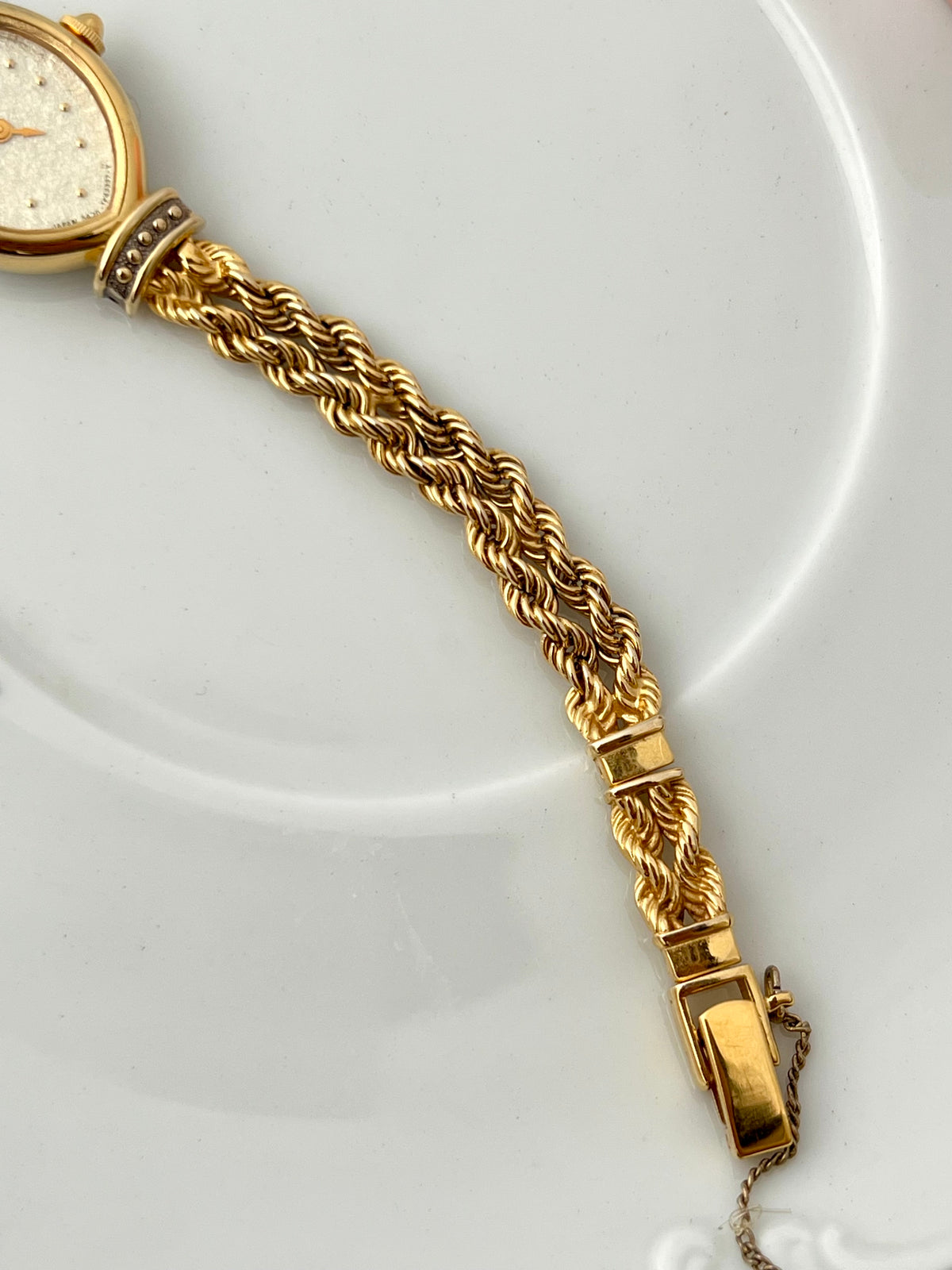 Citizen Sylph oval gold-tone ladies watch, case profile.