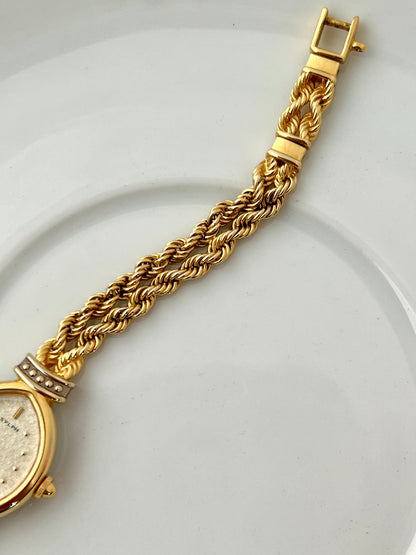 Citizen Sylph oval gold-tone ladies watch, bracelet detail.