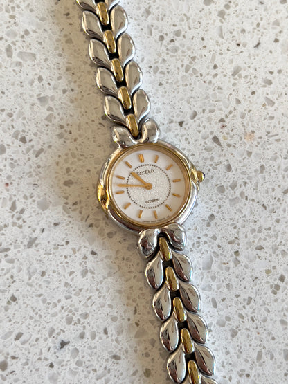 Citizen Two Tone Woman's Watch with Leaf Bracelet, Diamond Dust Dial & Blue Crown Stone, case profile of a vintage women's watch at Gilded Hour.