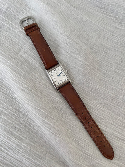Detail of the original Coach leather strap with decorative top stitching.