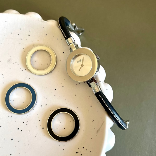 Coach Ladies’ Watch with Interchangeable Bezels, caseback detail of a vintage women's watch at Gilded Hour.