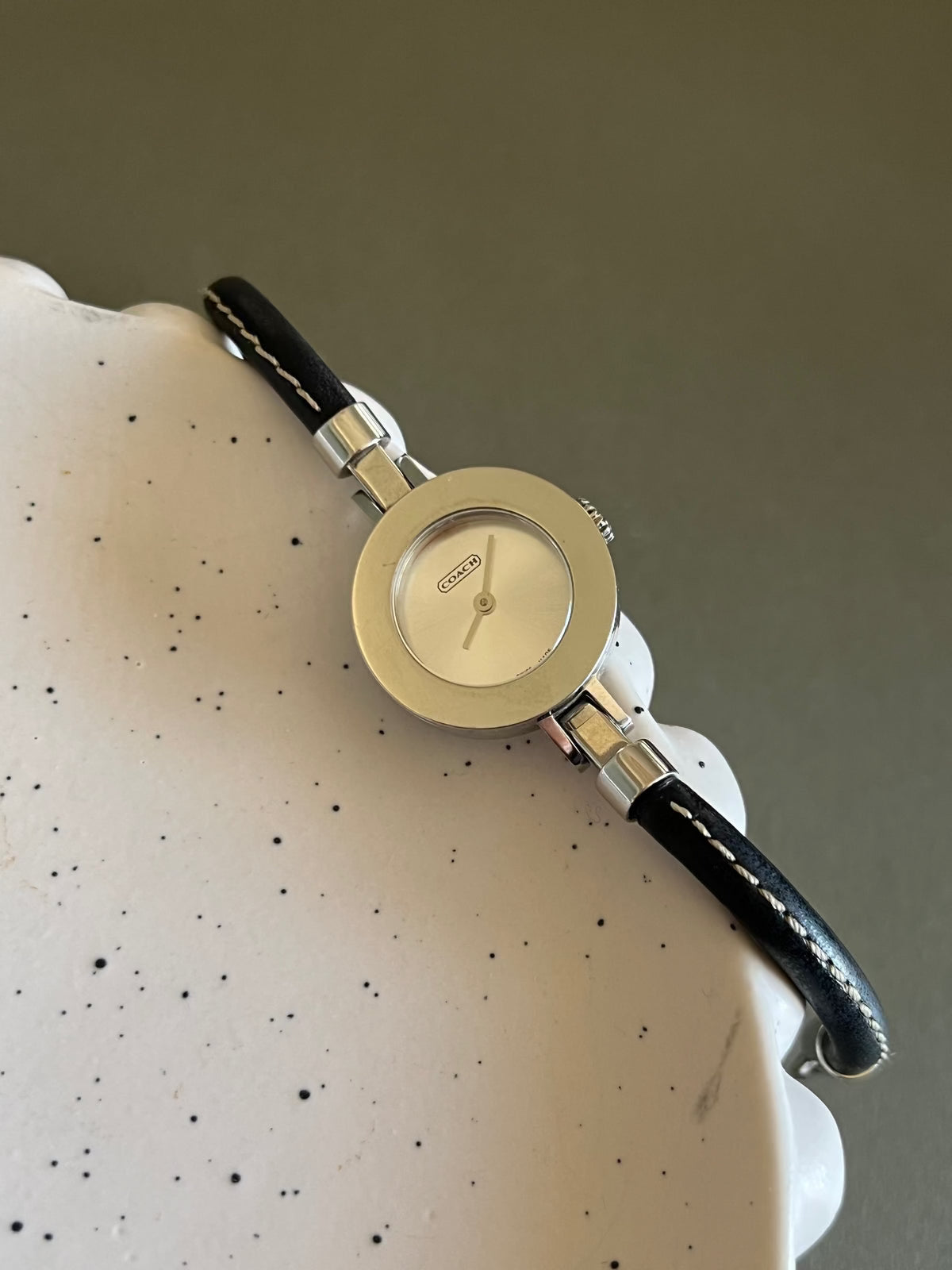 Coach Interchangeable Bezel Silver Women’s Watch; black leather strap with contrast stitching. Product photograph 3 of 7.