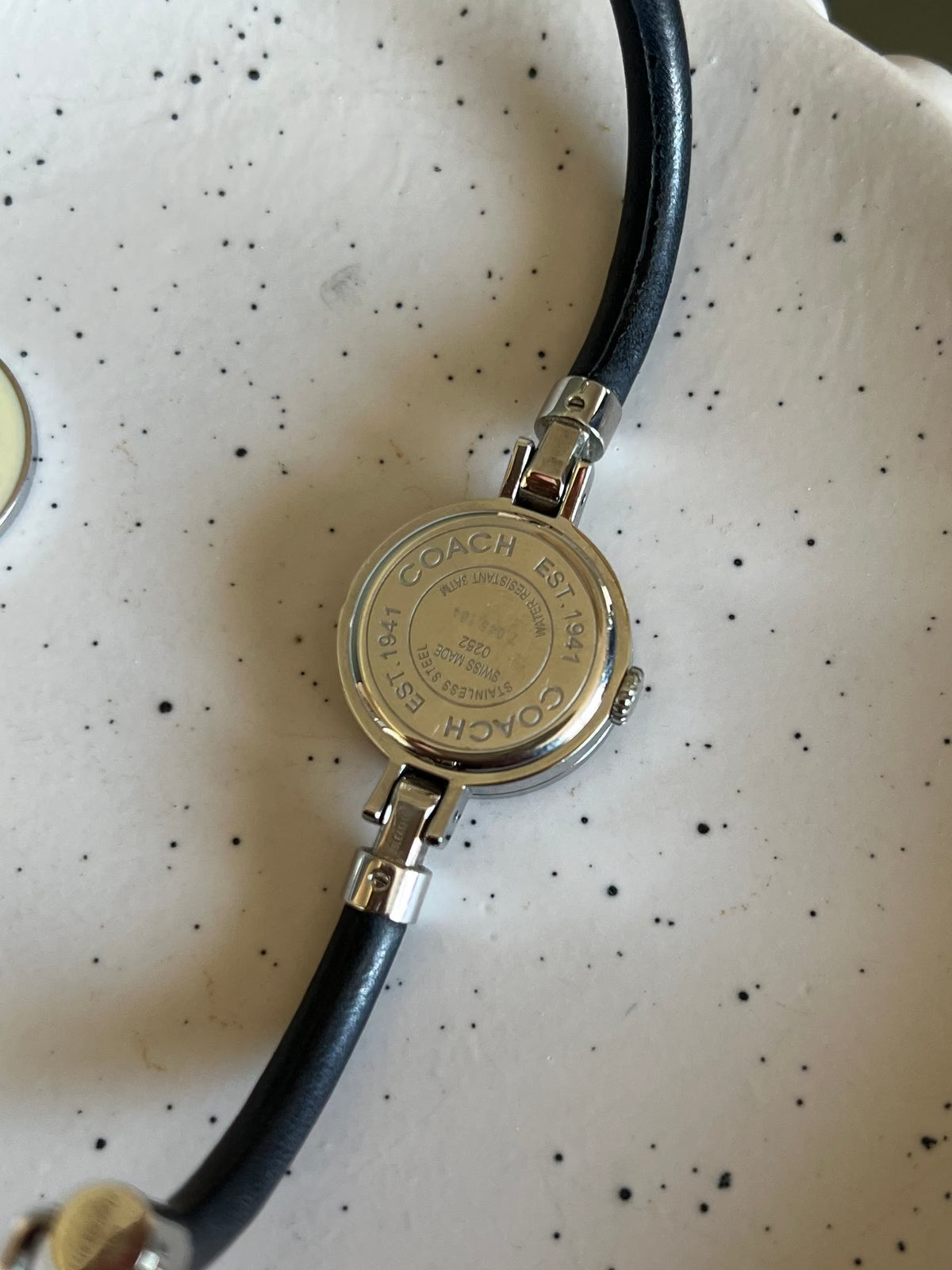 Coach Interchangeable Bezel Silver Women’s Watch; black leather strap with contrast stitching. Product photograph 6 of 7.
