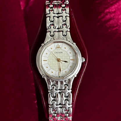 Credor geometric dial women’s watch with sculpted silver bracelet; product image 1.