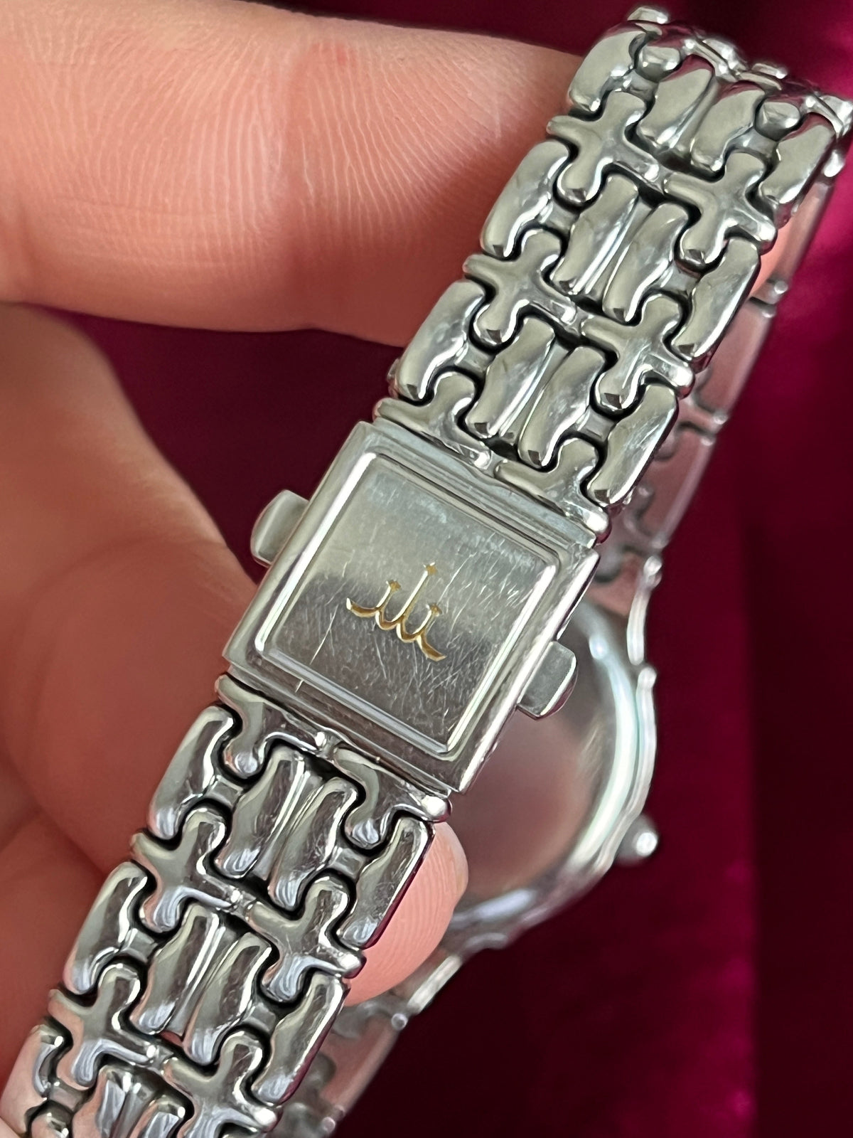 Credor geometric dial women’s watch with sculpted silver bracelet; product image 4.
