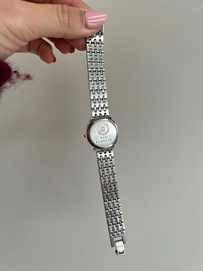 Cyma Sealord caseback marked 636 and 6100076, with the bracelet underside and open folding clasp.