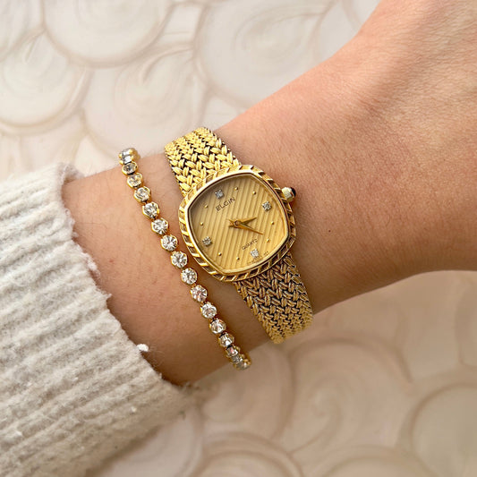 Elgin Gold Toned Square Woman's Watch with Crystal Accent — watch face and case shown from the front.
