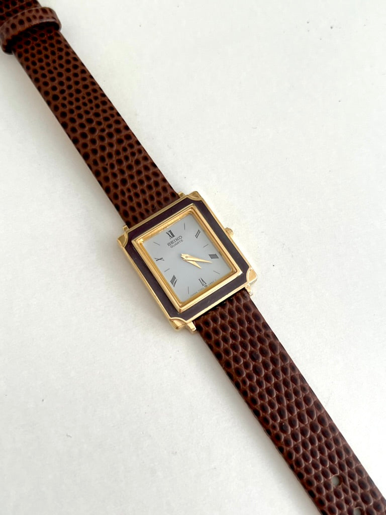Seiko Brown Frame Roman Dial Leather Strap Watch: opposite angle of brown frame.