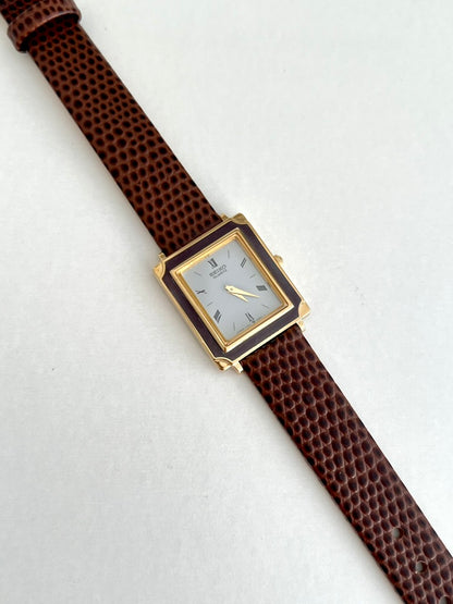 Seiko Brown Frame Roman Dial Leather Strap Watch: roman dial and glossy frame close up.