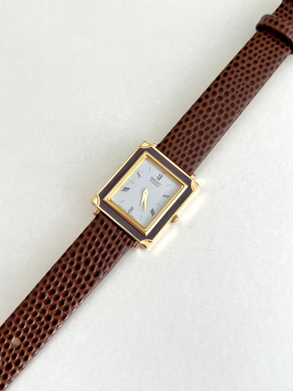 Seiko Brown Frame Roman Dial Leather Strap Watch: brown frame at an angle.
