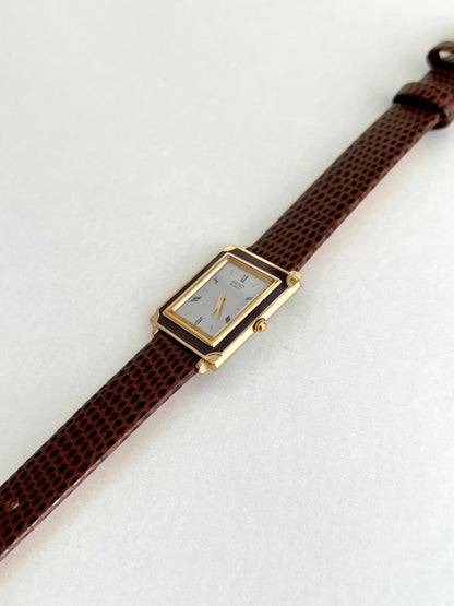 Seiko Brown Frame Roman Dial Leather Strap Watch: angled rectangular case.
