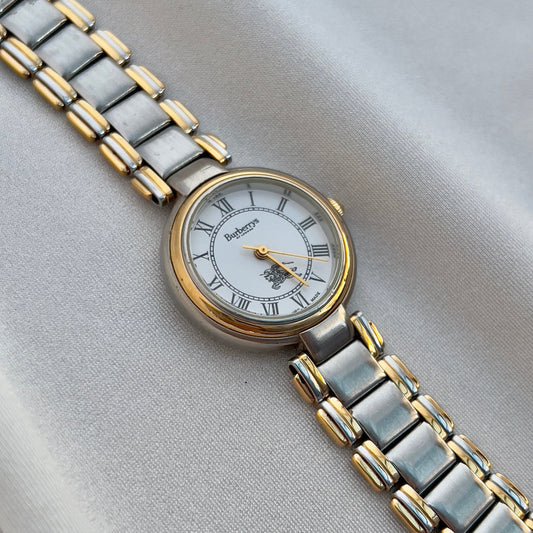 Burberrys Two-Tone White Roman Dial Ladies’ Watch, dial close up of a vintage women's watch at Gilded Hour.