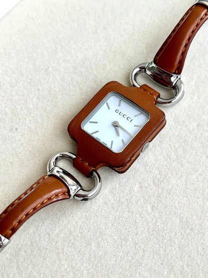 Gucci 1921 Leather Women’s Watch — leather wrapped square case close view